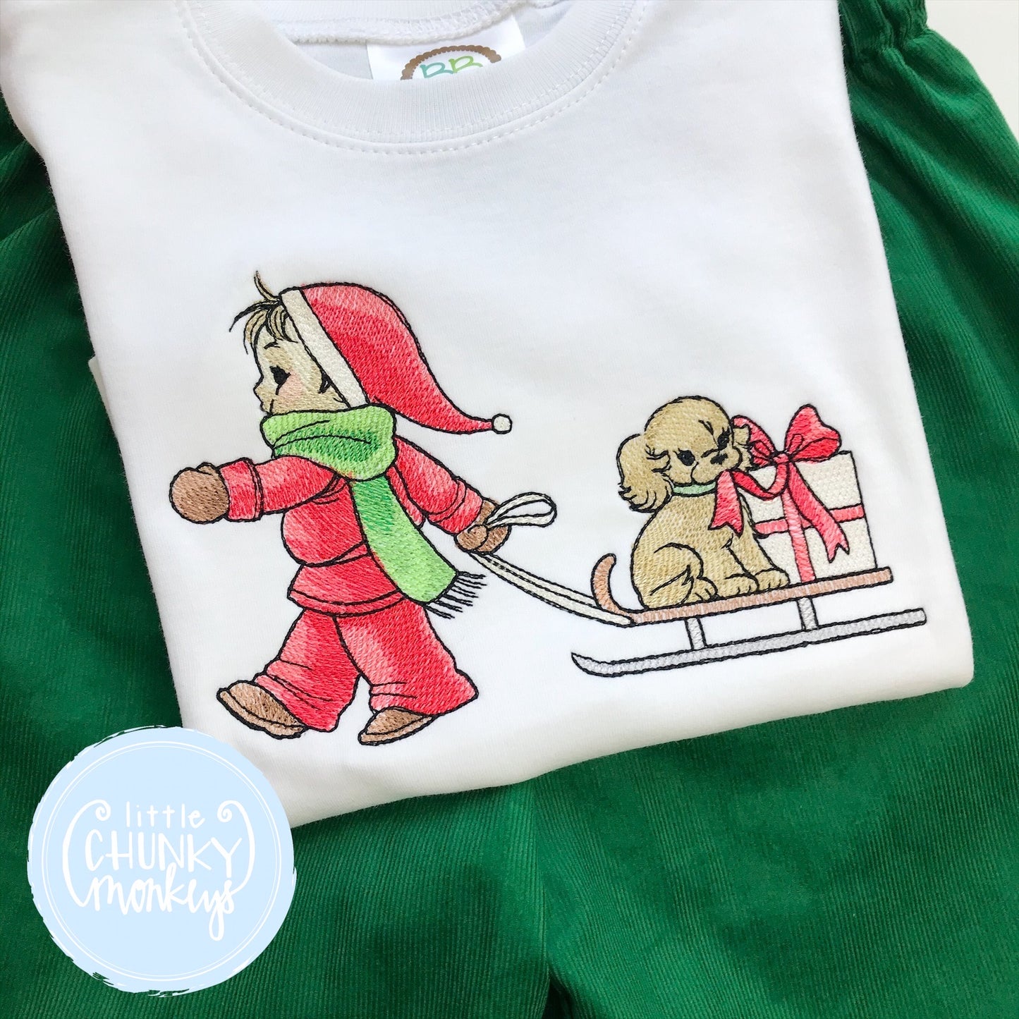 Shirt - Child pulling a dog in a sled